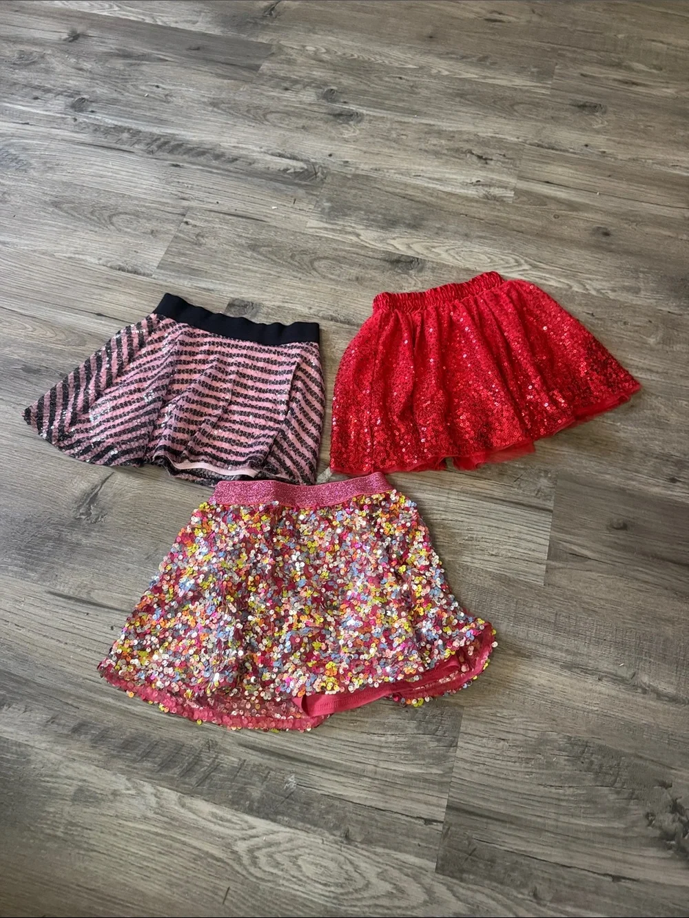 3 cute washed skirts, and sequence on all of them. For kids.